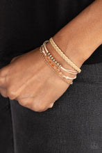 Load image into Gallery viewer, Intergalactic Gamechanger - Gold Bracelet - Paparazzi Accessories  HOSTESS
